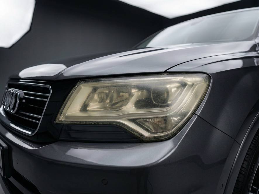 Hazy oxidized headlight before restoration